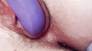 Play with my pussy with my purple vibrator