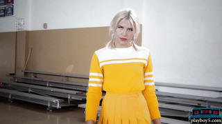 Petite blonde MILF cheerleader stripping