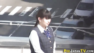 Chinese office dame in uniform took off her underpants in a public place to urinate on the sidewalk